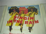 1952 GENE KELLY SINGING IN THE RAIN PO-FLAKE MOVIE POSTER 22X28 USED PO-162 COLLECTIBLE (f17)