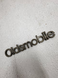 1980's OLDSMOBILE PLASTIC EMBLEM USED Automobile Collectible (Wayne)