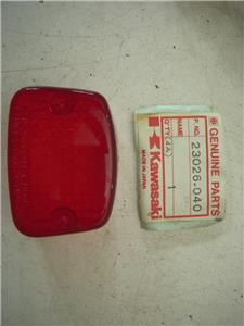 23026-040 1975-82 KT250 TRIALS 250 KDX400 KDX250 NOS KAWASAKI TAIL LIGHT LENS (RED105)