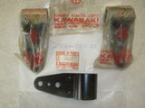 23064-003 1971-73 F7 175 NOS KAWASAKI HEADLIGHT MOUNT EAR (red116)