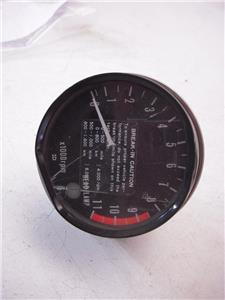 25015-1050 TACHOMETER 1977-80 KZ1000 NOS KAWASAKI CRACKED DENTED AS IS (red116)